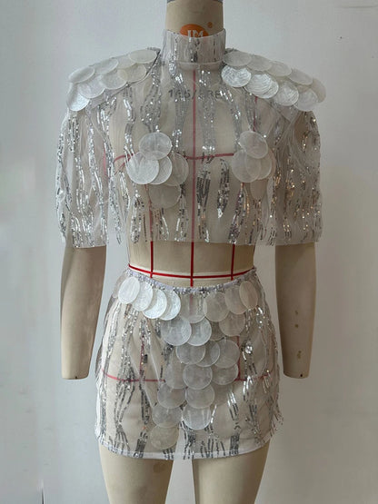 JULISSA MO Sexy See Through Sequin Shiny Women Skirt Sets Silver Round Neck Top Mini Skirt Summer Slim Fashion Holiday Beach Set